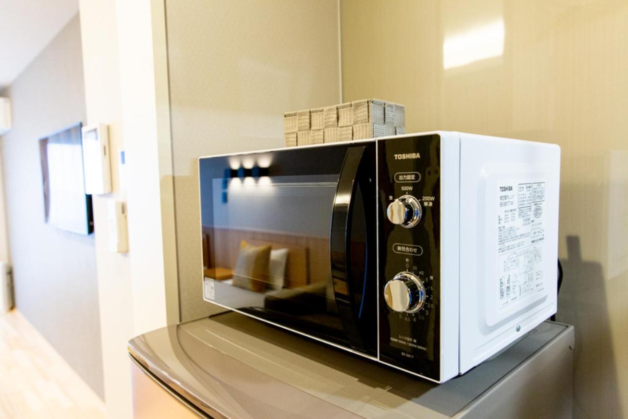 Aparthotel Grand Base Hiroshima Hikarimachi Esterno foto