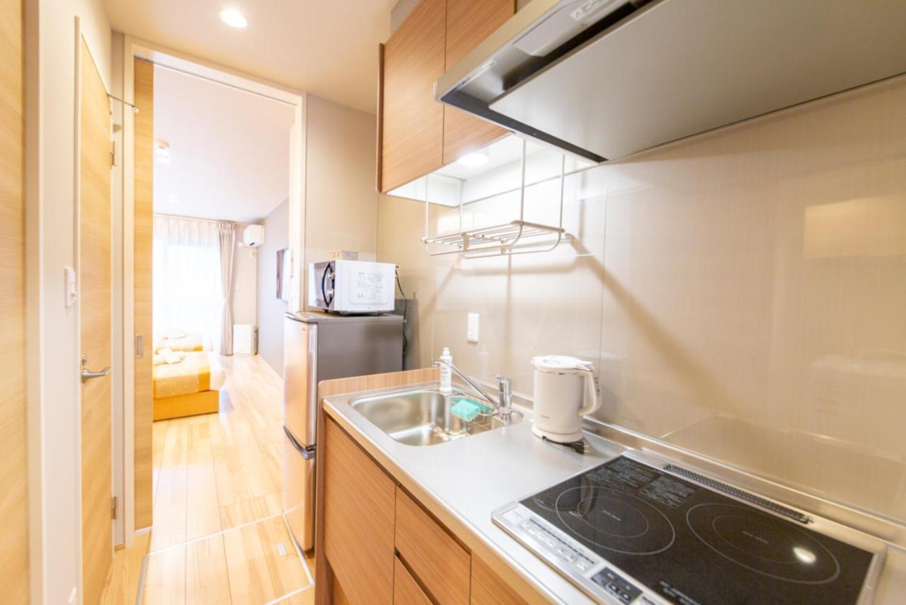 Aparthotel Grand Base Hiroshima Hikarimachi Esterno foto